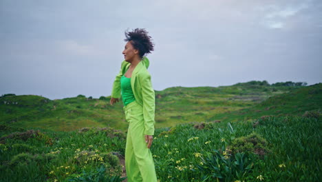 expressive girl artist dancing outdoors performing modern at nature vertically
