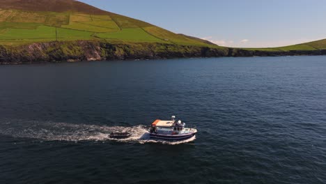 filming a boat at dunquin pier - dingle co.kerry - 4k cinematic drone footage 05-13