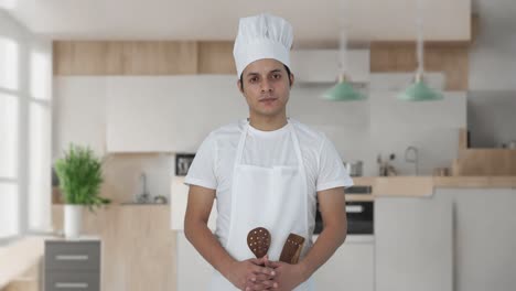 Confident-Indian-professional-chef-looking-to-the-camera