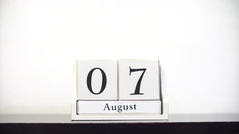 white calendar time lapse august