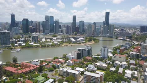 panoramic aerial overview of suburb of brisbane australia and river at midday