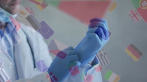 animación de banderas mundiales flotantes con las manos de un médico que se pone guantes