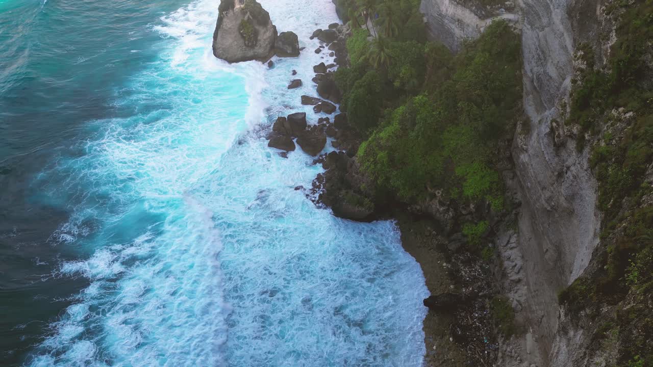 waves crashing in the cliff of Diamond beach in Nusa Penida - Bali, Indonesia