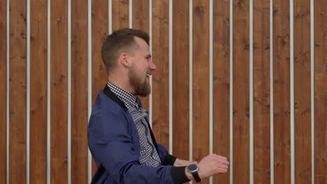 happy man pointing at camera