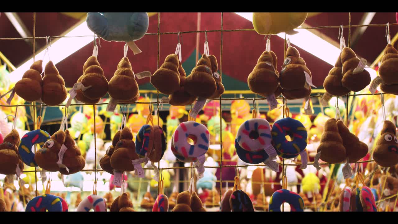 Plush toys hanging emojis and doughnouts