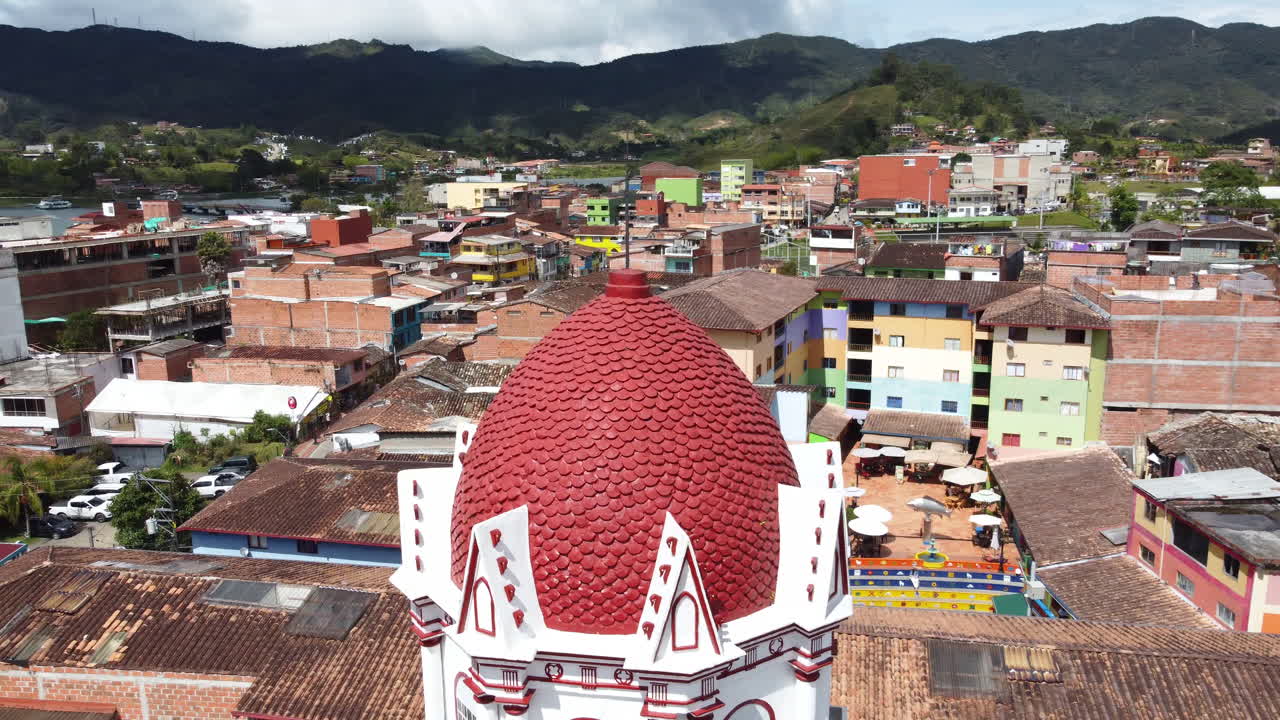 Bird's-eye view of the roof top of a colorful church in Guatape, Antioquia, Colombia.