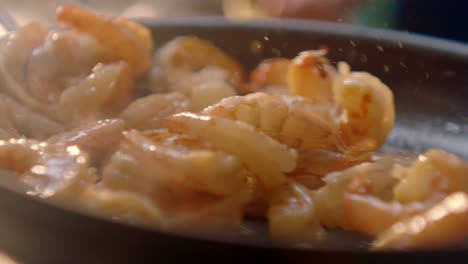 succulent shrimp tossed in a sizzling frying pan