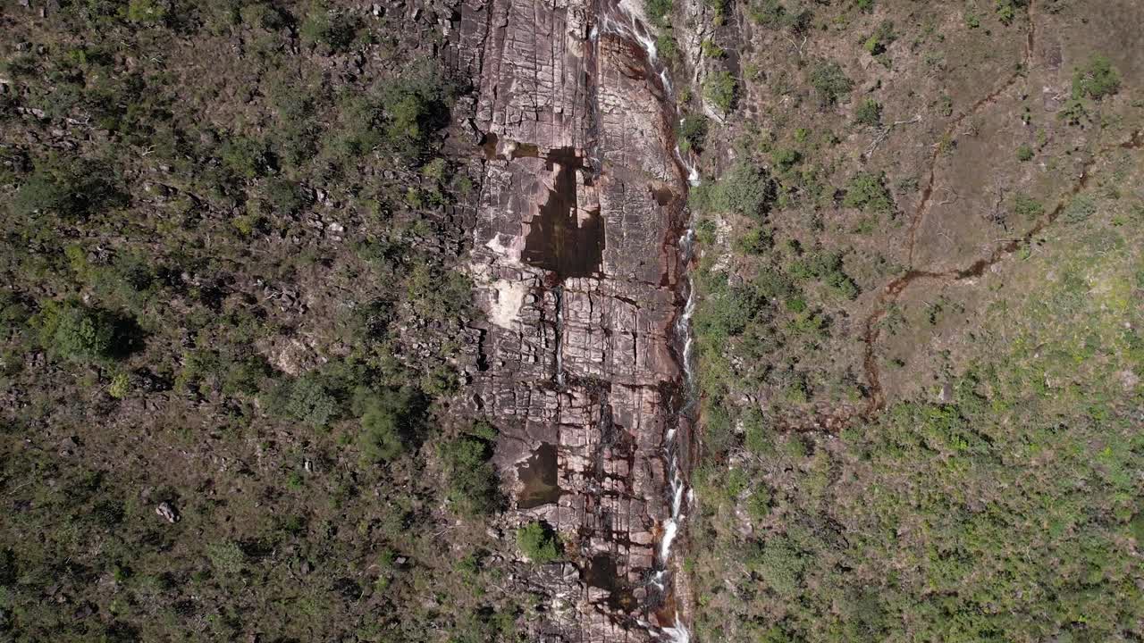 aerial view of river flowing through rocks, Chapada dos Veadeiros National Park, Goi&aacute;s, Brazil