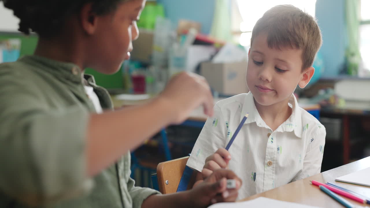 Two students working together in the classroom