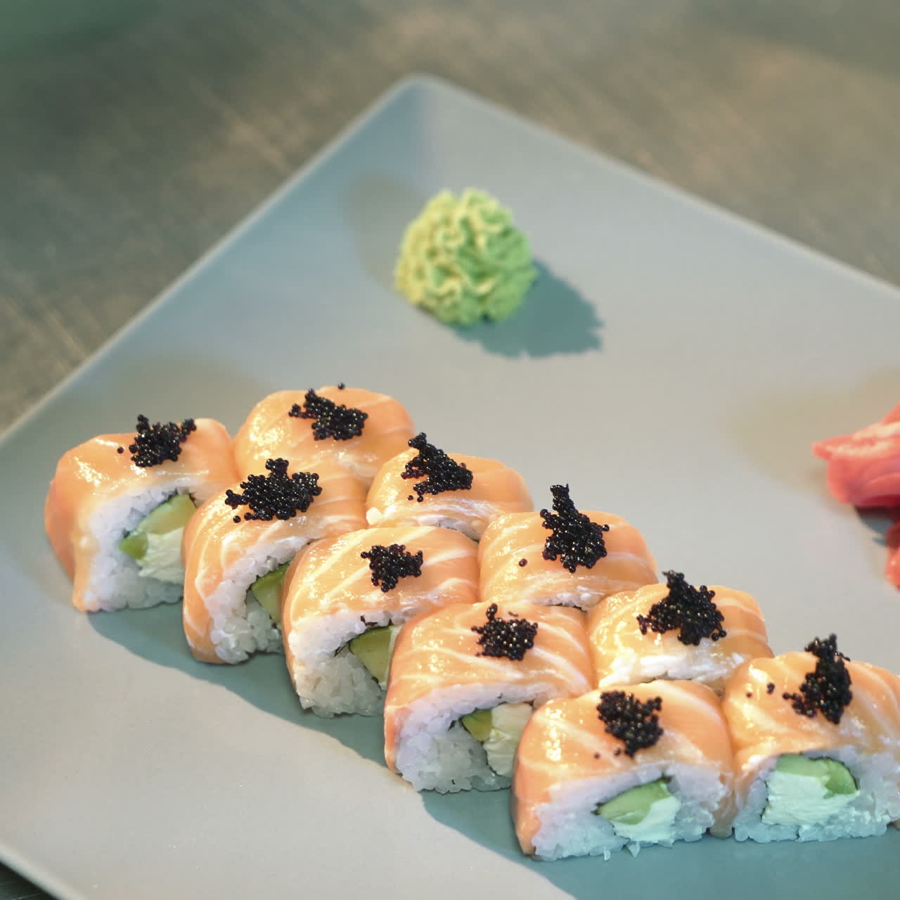 Sushi Philadelphia. Professional chef prepares rolls for the client in a commercial kitchen. Sqare video