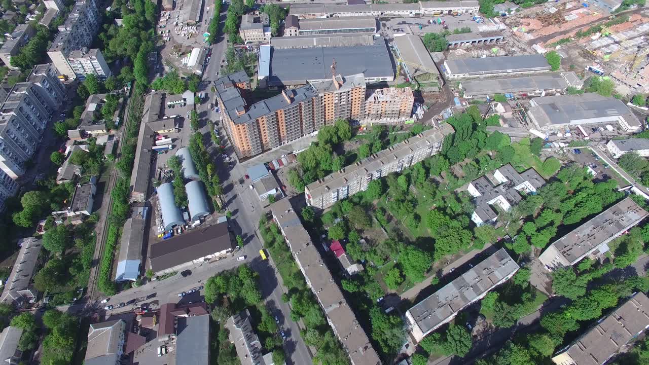 Aerial shot of the crossroads and roads, houses, buildings, urban landscape