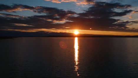 Sunset-and-flying-with-a-DJI-drone-over-the-Lake-Balaton,-Hungary