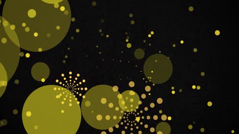 animation of orange firework explosions and bokeh yellow light spots on black background