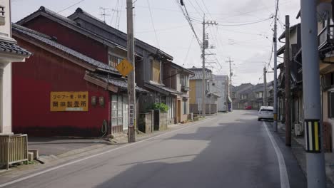 rural japanese town, slow motion pan across empty streets