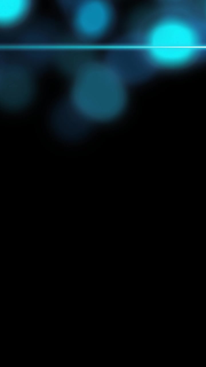 Animation of flashing defocused blue light spots on black background