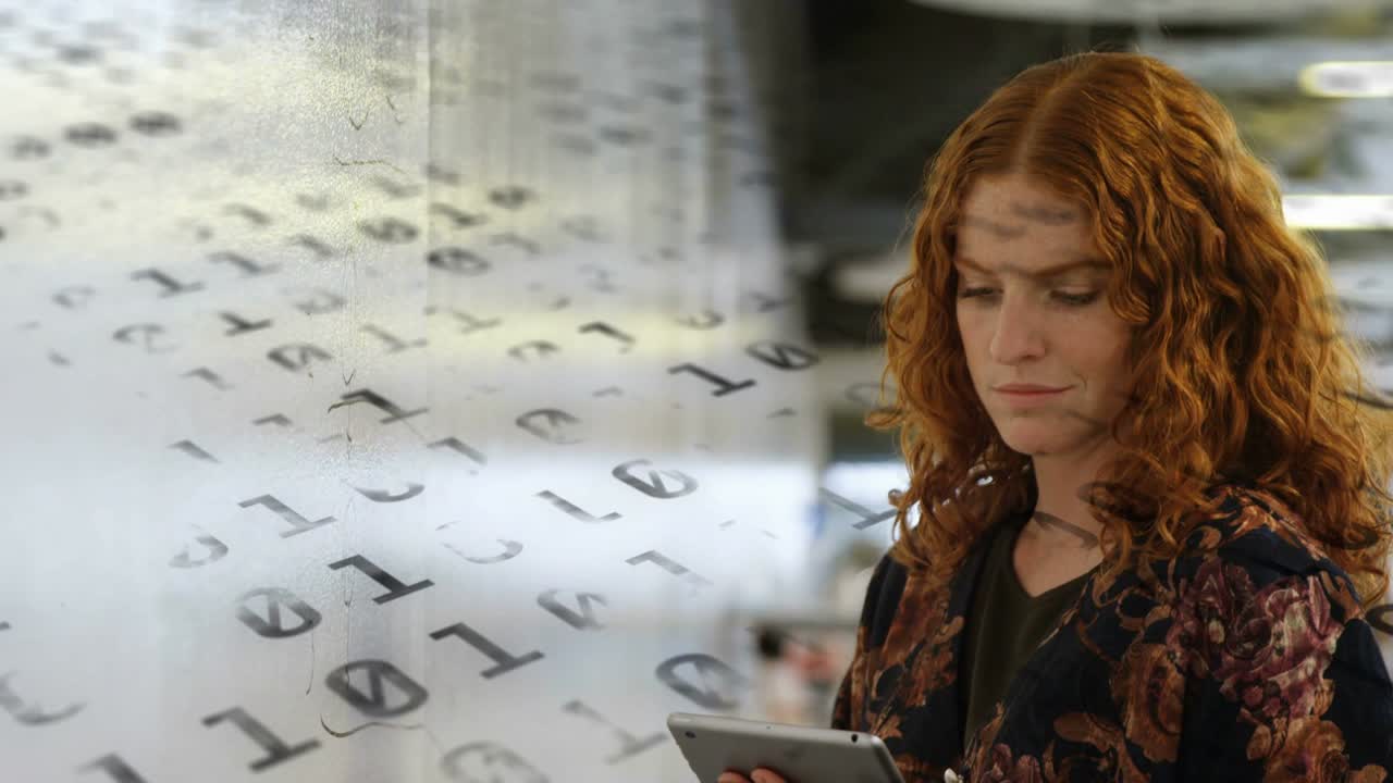 Woman tapping tablet activating shifting binary overlay, scanning data and smiling for tech review