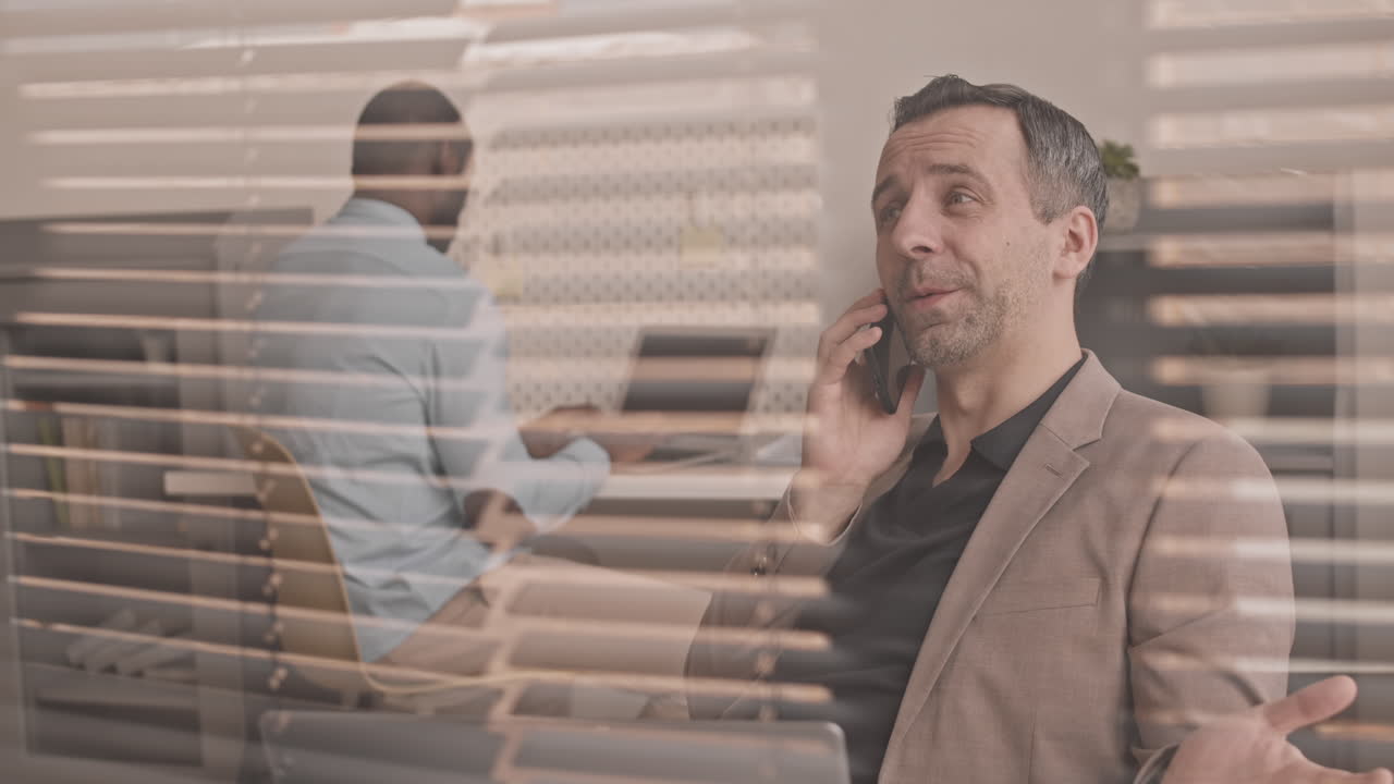 Successful Manager Having Phone Conversation