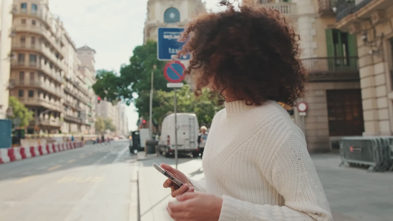 Woman Hailing a Taxi in the City