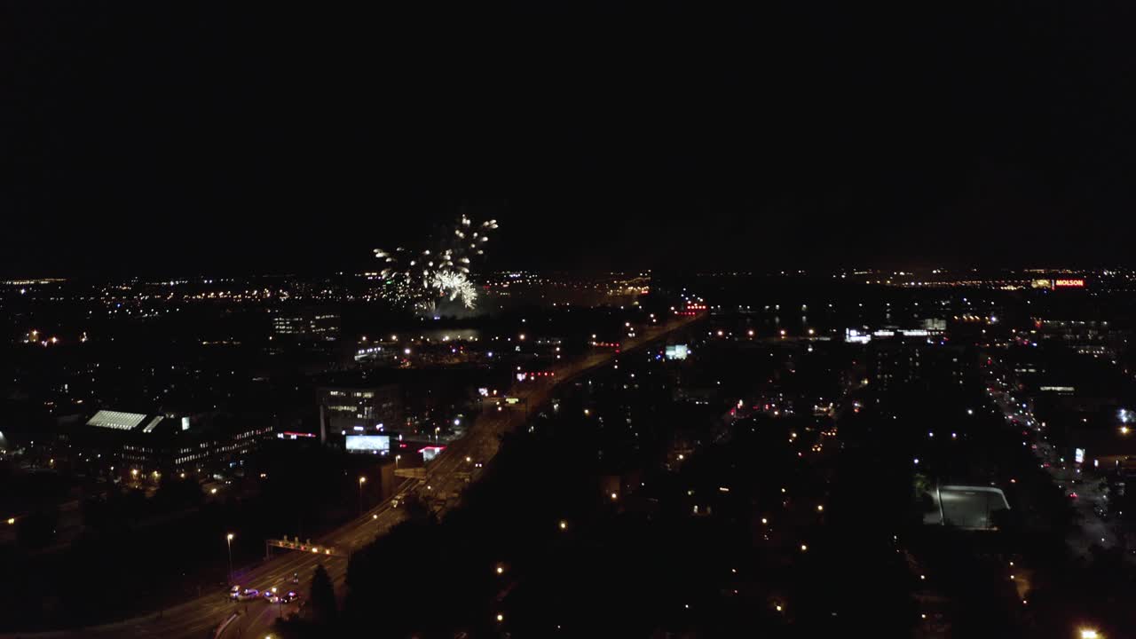 Aerial image of a firework display on a summer night in Montreal, Quebec, Canada