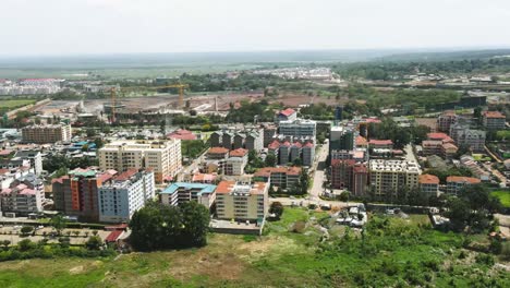 dji mavic air 2 flying in the estate in kenya, drone moving panaromic view from the estate in kibera kenya