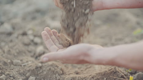 Farmer-Pouring-Organic-Soil-2