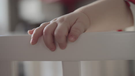 Cute-baby-girl-in-a-round-crib-3