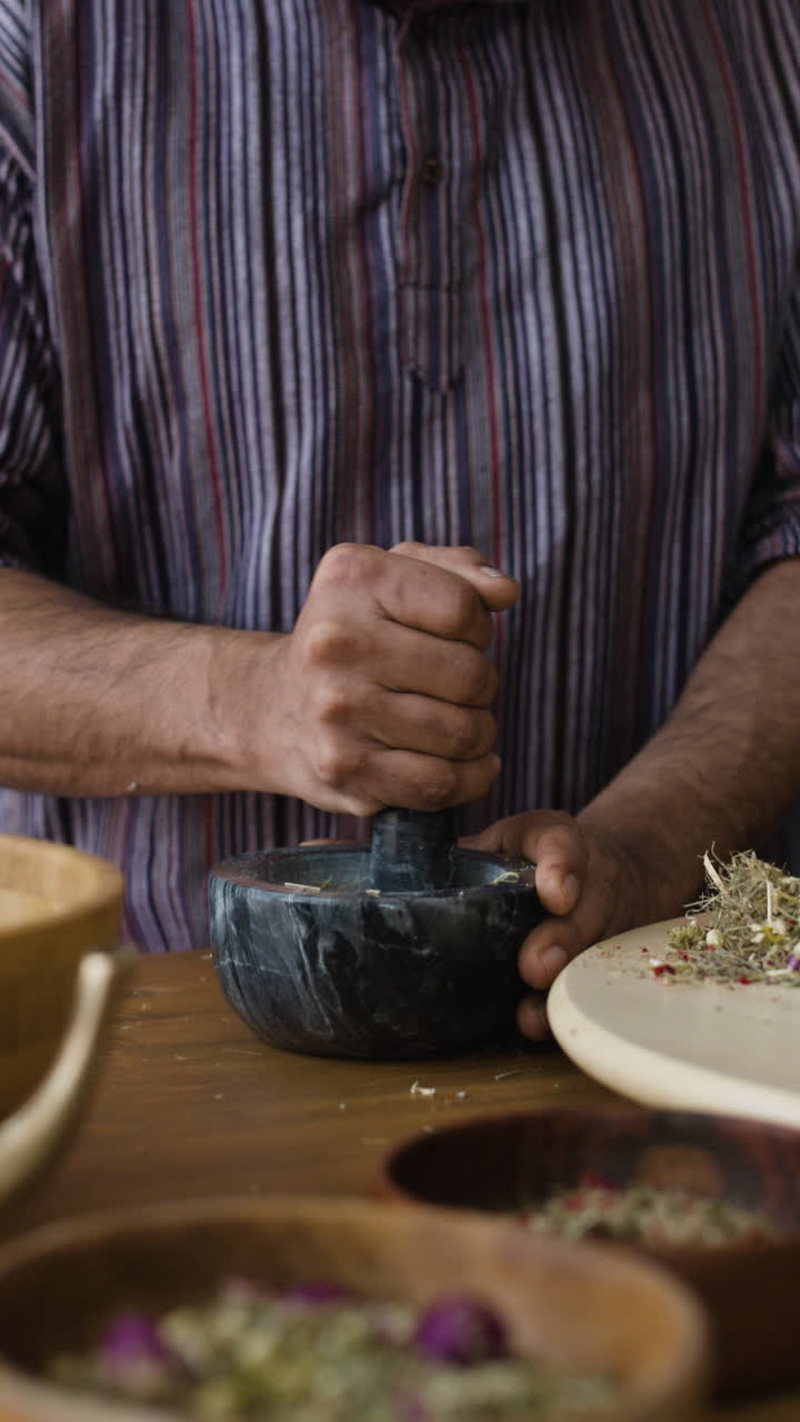 Preparing herbs with mortar and pestle