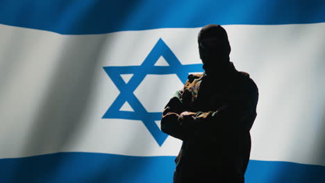 mossad agent standing proud in front of israel flag