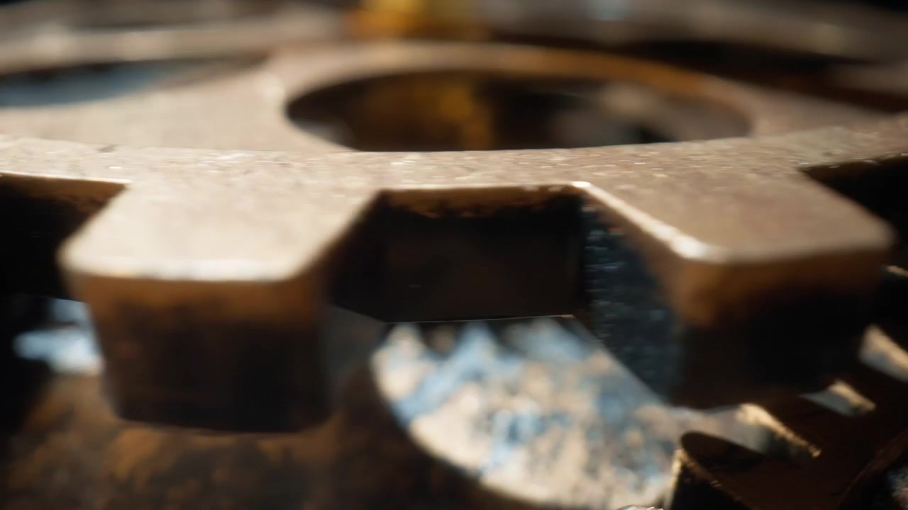Foto macro de um relógio vintage com engrenagens e rodas dentadas de metal