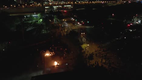 aerial footage of protest responding to george floyd murder in minneapolis, minnesota at night