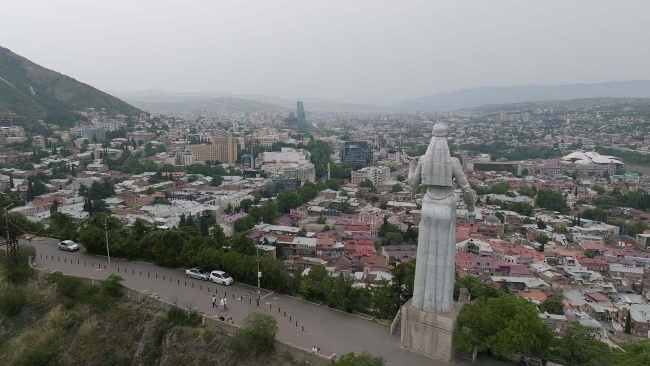 Panorama of the Tbilisi and the back of Kartlis Deda statue during daytime
