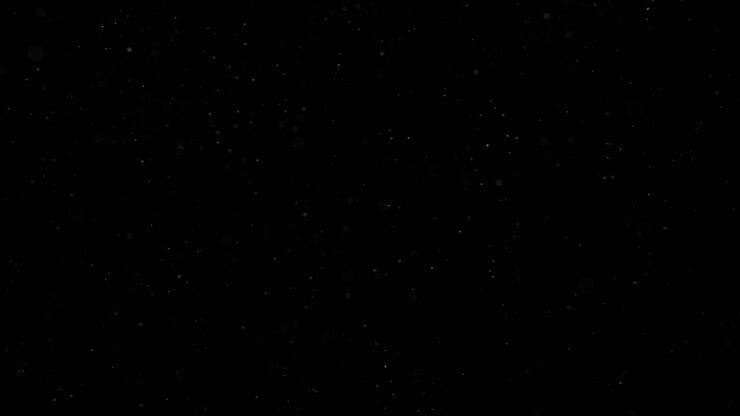 polvo flotando en el aire sobre fondo negro 01