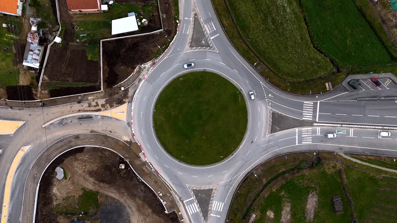 Aerial - roundabout with cars and green center in Revinhade Felgueiras Portugal
