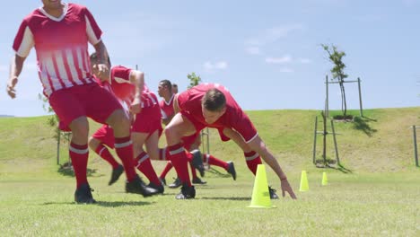 Soccer-players-training-on-field