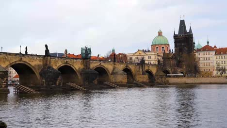 charles bridge over vltava river and old town bridge tower in prague, czech republic