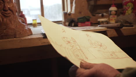 wooden carving design sketch in workshop