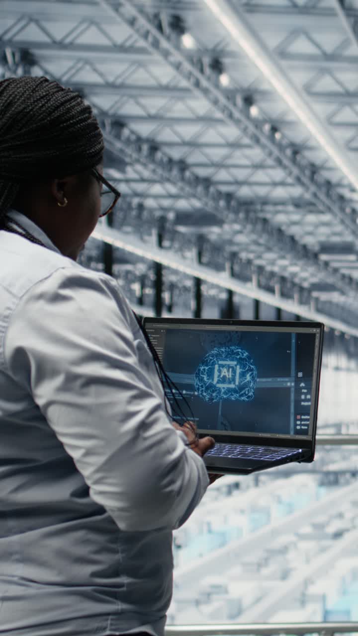 Vertical video Woman and microchip factory colleague using AI to develop technology roadmap