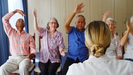 doctor teaching exercise to senior people 4k