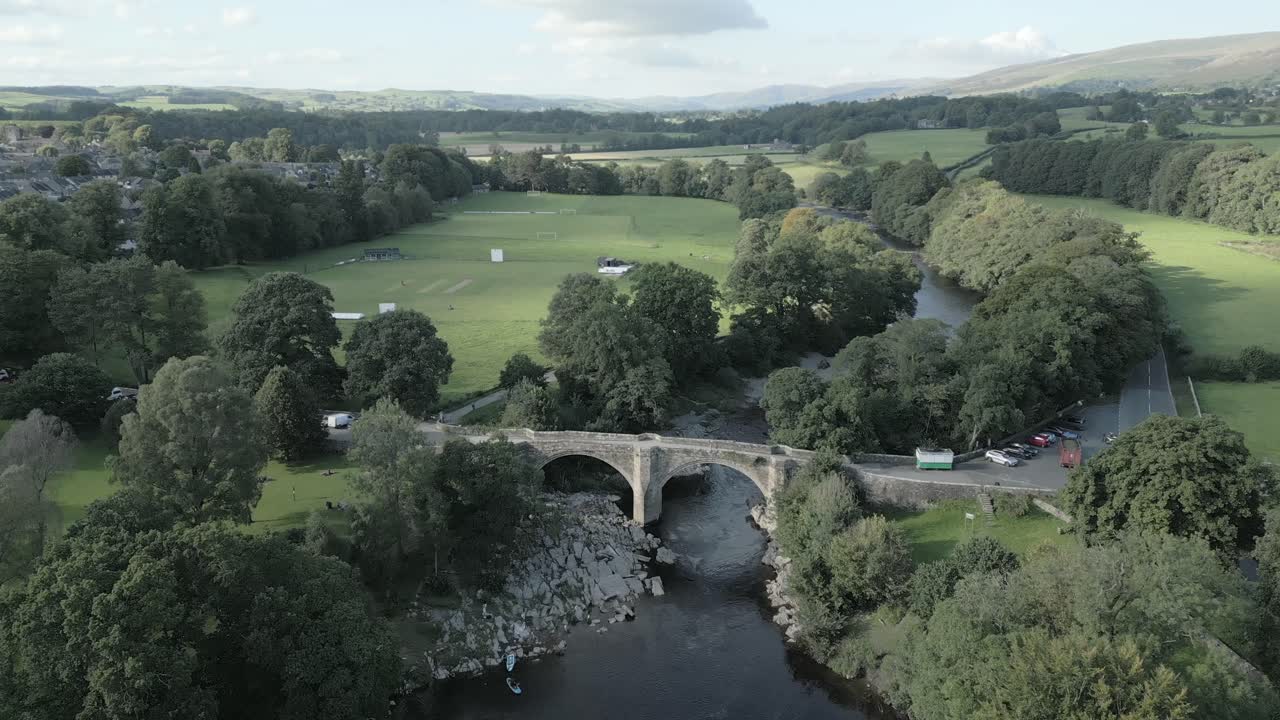 An aerial view of the Devil's Bridge at Kirkby Lonsdale on a summer evening, Yorkshire, England, UK