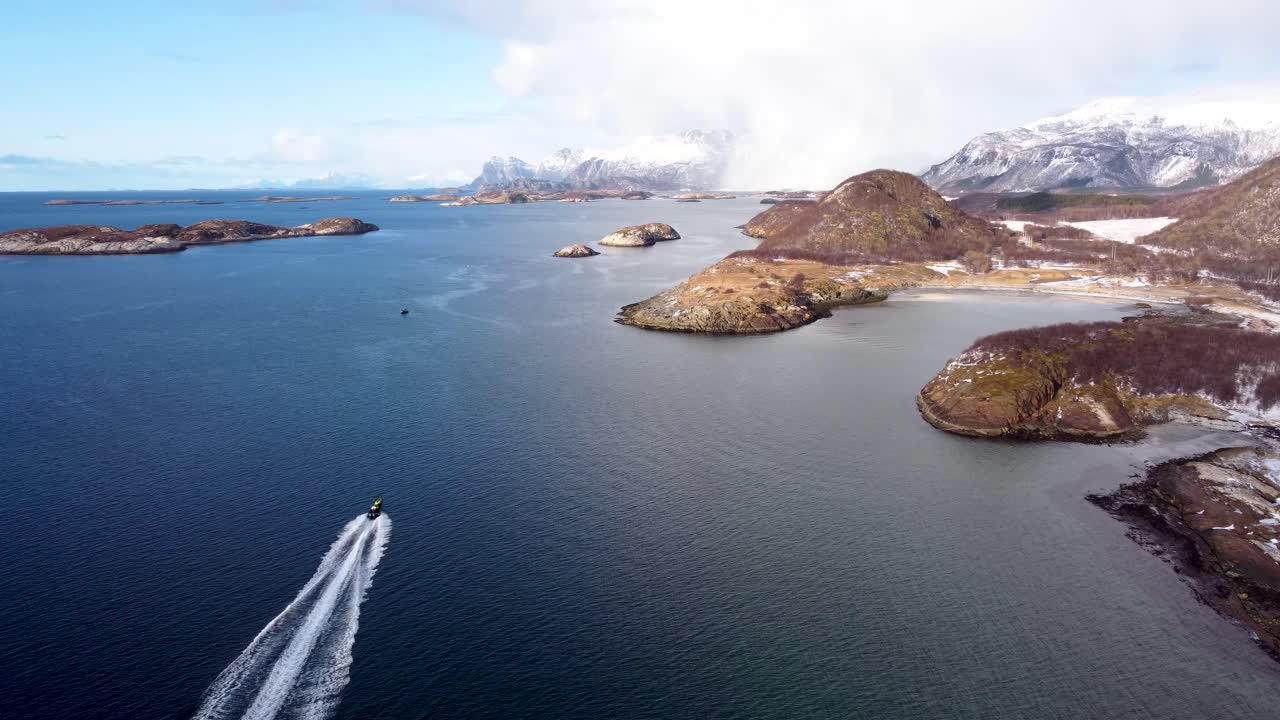 This 4K drone video showcases the RIB safari in arctic ocean of Norway. Snow-covered mountains, frozen fjords, and Arctic beauty with the fast running boat in the stuning detail.