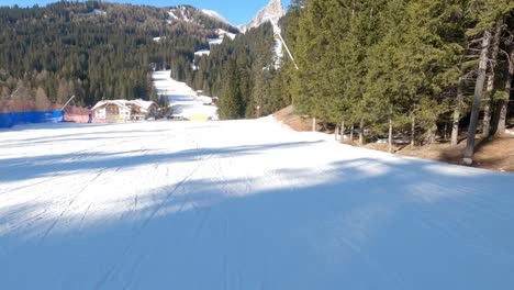 fpv pov of alpine skiing in dolomites, italy