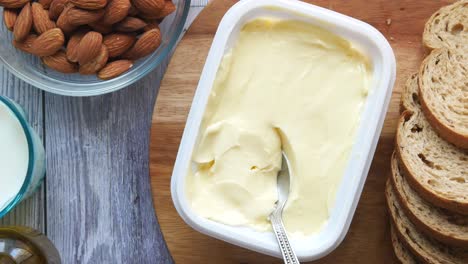 butter, almonds, and bread for a healthy breakfast