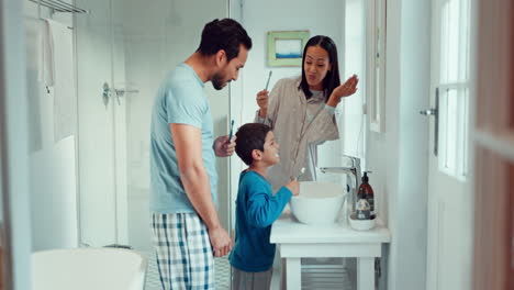 Parents,-child-and-brushing-teeth-in-family-home