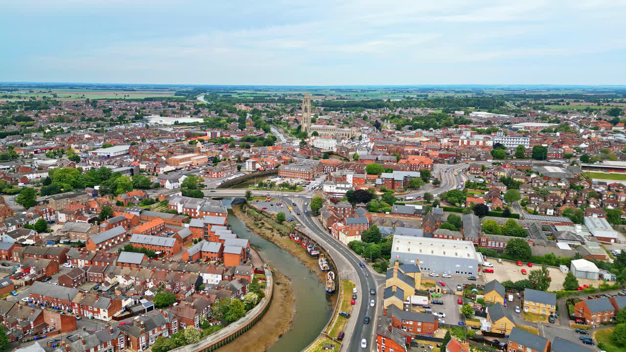 scenic beauty of Boston, Lincolnshire, in mesmerizing aerial drone footage: Port, ships, Saint Botolph Church , Saint Botolph's Bridge