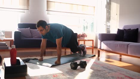 man doing exercises  in the living room