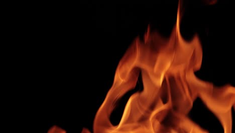 Flames-of-fire-on-black-background-in-slow-motion