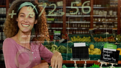 animation of data processing over caucasian woman shopping