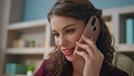 business manager consulting smartphone closeup. friendly employee speaking cell