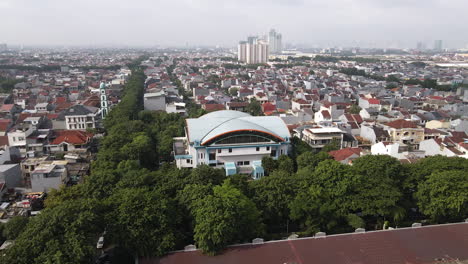 Aerial-View-Of-Buildings-And-City-Skyline-In-Jakarta,-Indonesia-On-A-Sunny-Day