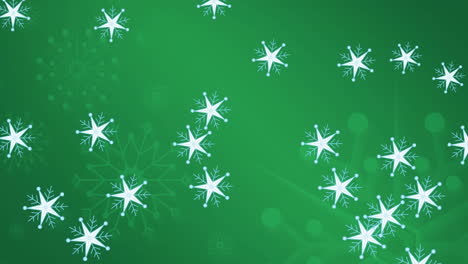 animación de copos de nieve moviéndose sobre un fondo verde